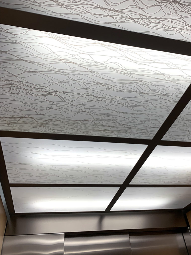 Photograph of a line pattern on a ceiling in one of Baptist Health’s hospitals
