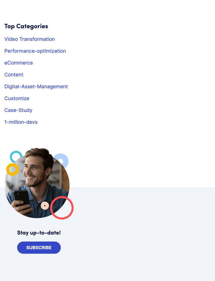 A portion of a web page listing top categories followed by a photograph of a young, bearded man holding a phone. Towards the bottom of the photo, the page transitions from white to gray background containing a button to subscribe to updates. The column of text, images and buttons take up a third of the screenshot leaving most of the page empty.