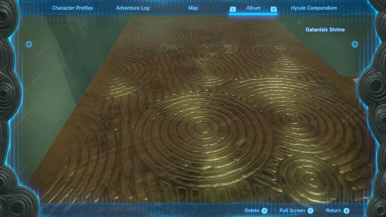 A camera capture of a gold textured floor showing the circle and squiggle pattern