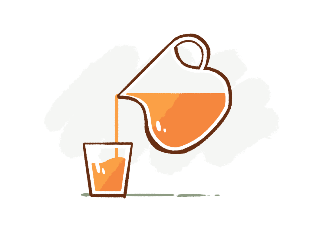 A tasty beverage is poured from a pitcher to a glass